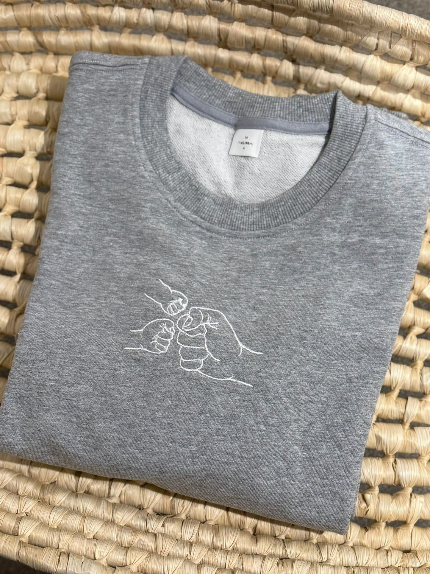 The Fist Bump Sweater
