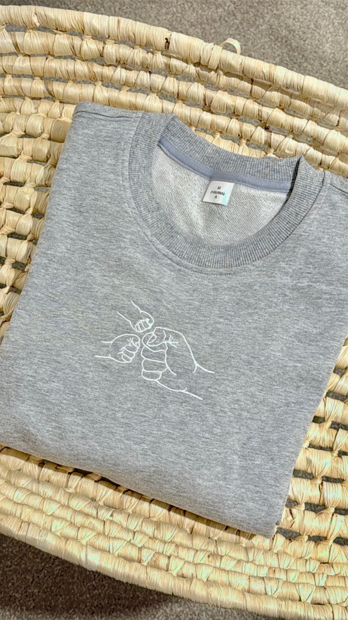 The Fist Bump Sweater